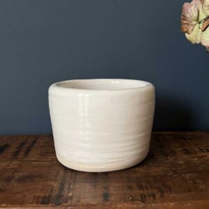 small white glazed pot