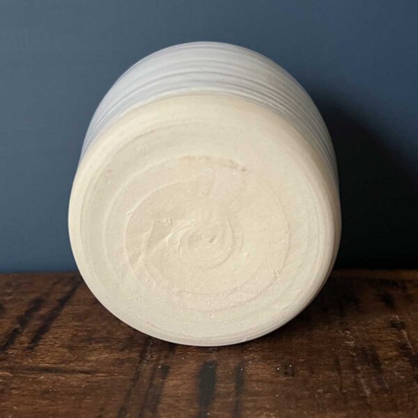small white glazed pot