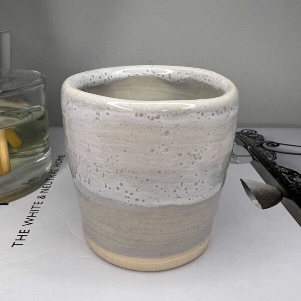 small grey ceramic pot