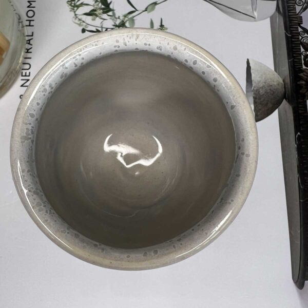 small grey ceramic pot