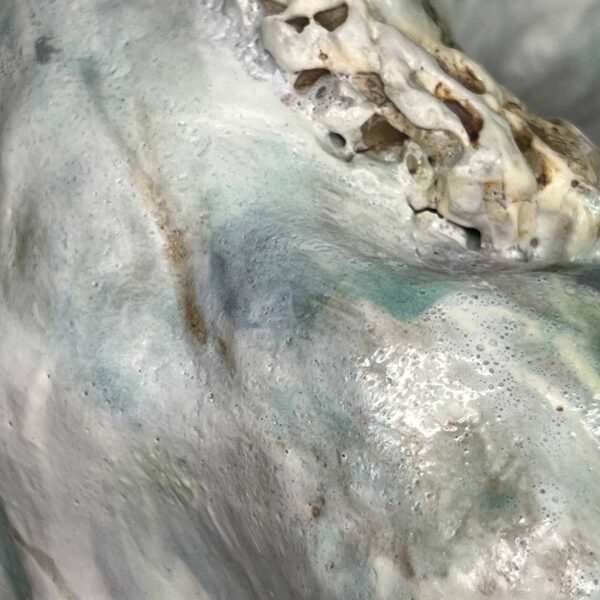 detail showing uneven glaze technique