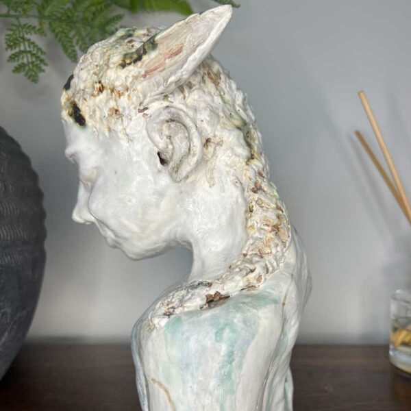 ceramic lamb human sculpture representing spring - side