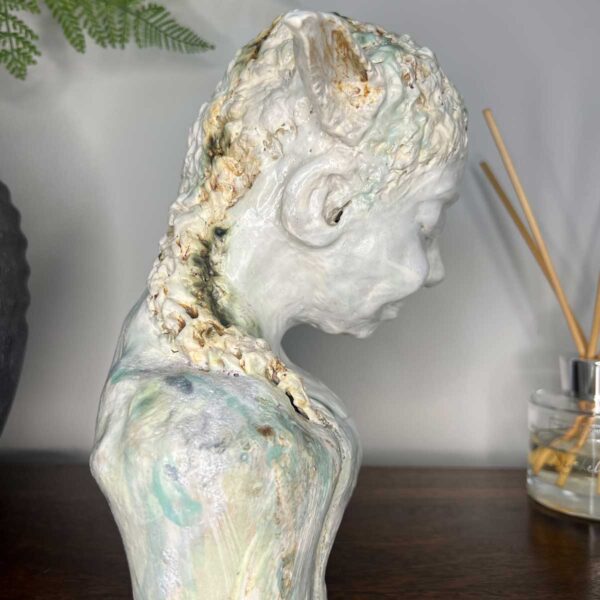 ceramic lamb human sculpture representing spring - side