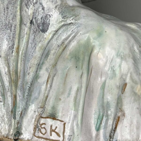spring ceramic figure rabbit human springs wisdom reverse detail