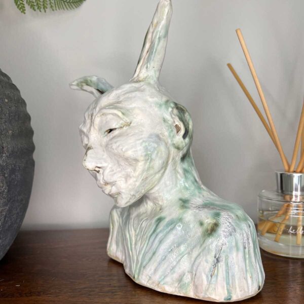 spring ceramic figure rabbit human springs wisdom side detail