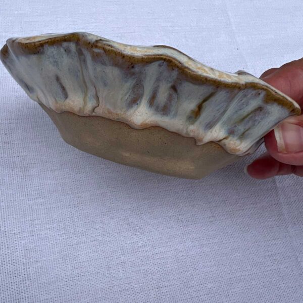 scalloped ceramic bowl natural design