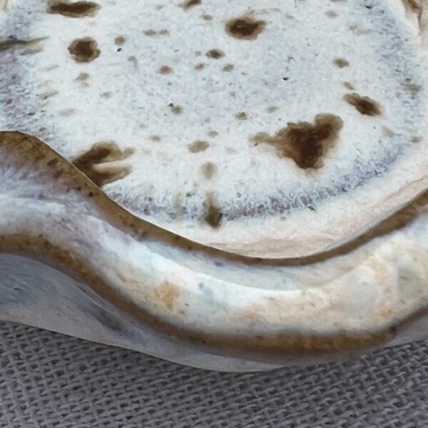 scalloped ceramic bowl natural design